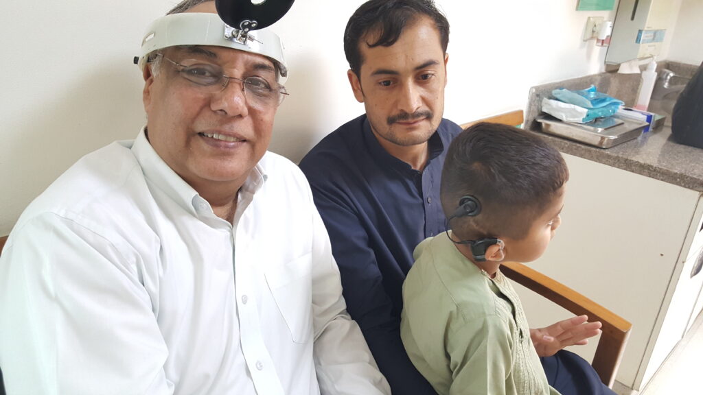 Dr. Sanjay Sachdeva with patient